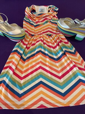 purple and gold chevron dress Plum Chevron Embroidered Set A deep plum ensemble adorned with rhythmic  chevron embroidery creates a striking visual cadence. Structured yet fluid,  the silhouette celebrates symmetry and craftsmanship where heritage  patterning meets contemporary