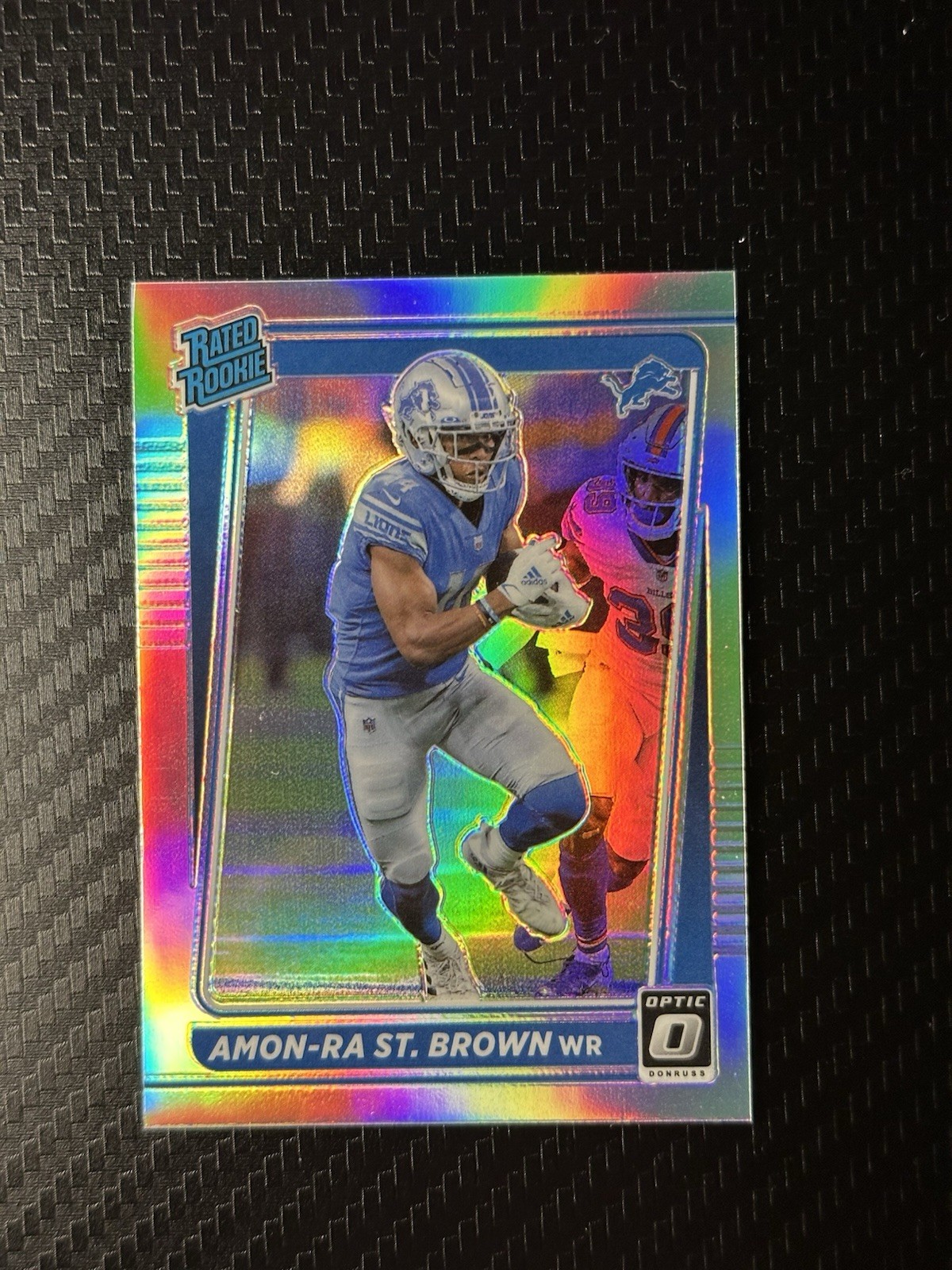 2021 Panini Donruss Optic Football AMON-RA ST. BROWN RC Rated Rookie Holo Prizm 