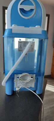 Lave linge de voyage portative, en très bon état - Photo 1/4