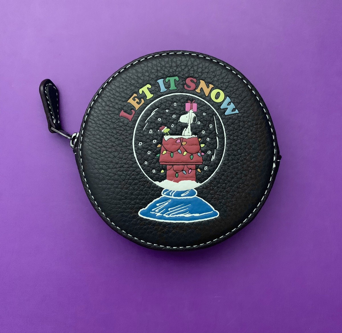 COACH×peanuts⭐︎ラウンドケーススヌーピーレットイットスノー Coach