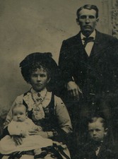 HANDSOME FAMILY WITH VERY CUTE BABY AND GRUMPY SON. TINTYPE.