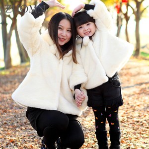 mother and daughter matching coats