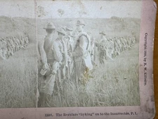 Antique Stereoview Card: The Regulars "hyking" on to the Insurrectos, P.I.