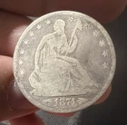 1874 ARROWS SEATED LIBERTY SILVER HALF
