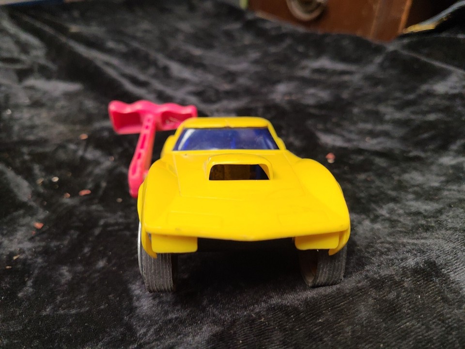 Vintage 1970 Cragstan Yellow Corvette Lever Car Toy Rare Pull Handle