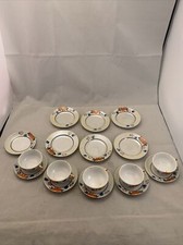 Vintage Made in Japan Child's Tea Set 5 teacups, 6 saucers  6 plates w/flowers