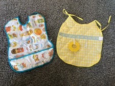 Vtg baby bibs. One fabric gingham, one vinyl teether toy attachment Baby Cookie