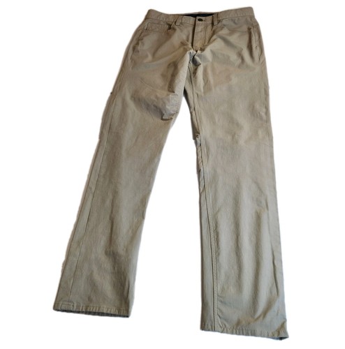 Pantalones ajustados de rendimiento para hombre Vineyard Vines beige frente plano golf elásticos - Imagen 4 de 15