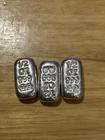 3 X 1/2 oz silver bar.  .999.  Total 1.5oz
