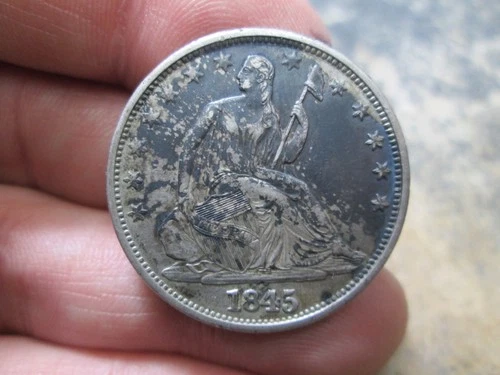 1845 O US SEATED LIBERTY SILVER DOLLAR IN EXTRA FINE CONDITION