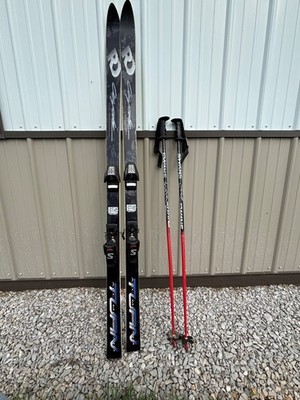 snow skis with bindings brand is Salomon, skis come with poles and bindings!