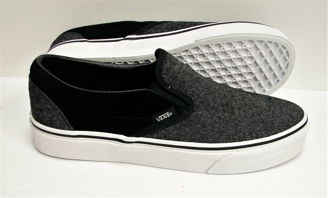 vans black sole slip on