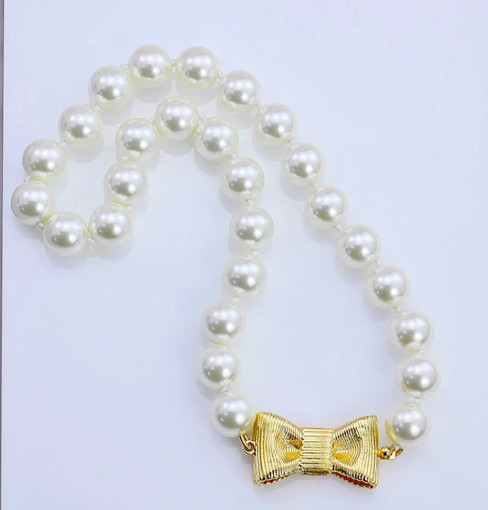 Kate spade pearl sale necklace with bow