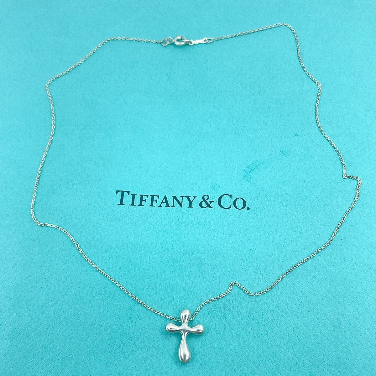 Tiffany small sale cross necklace