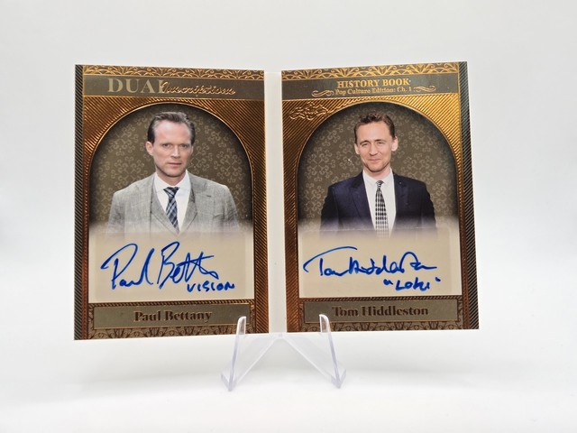 Tom Hiddleston Paul Bettany 2024 Leaf History Book Dual Auto SP /20 Avengers