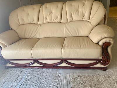 Brand New Set of 3 cream colored Hand stitched Leather couches with wood work