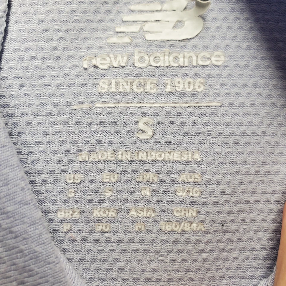 New Balance Top Mujer Pequeño Púrpura NB Rejilla Térmica Pullover Agujero para Pulgar Reflectante Foto 3 de 4