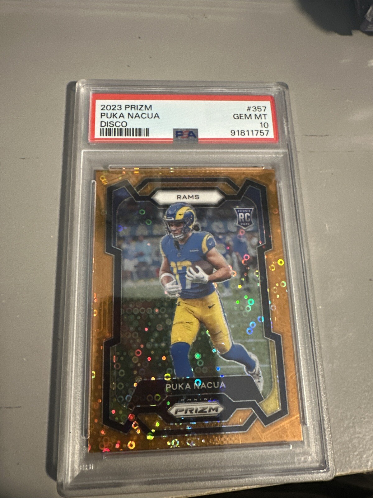 2023 Panini Prizm Puka Nacua #357 Orange Disco LA Rams Rookie RC PSA 10 Gem Mint