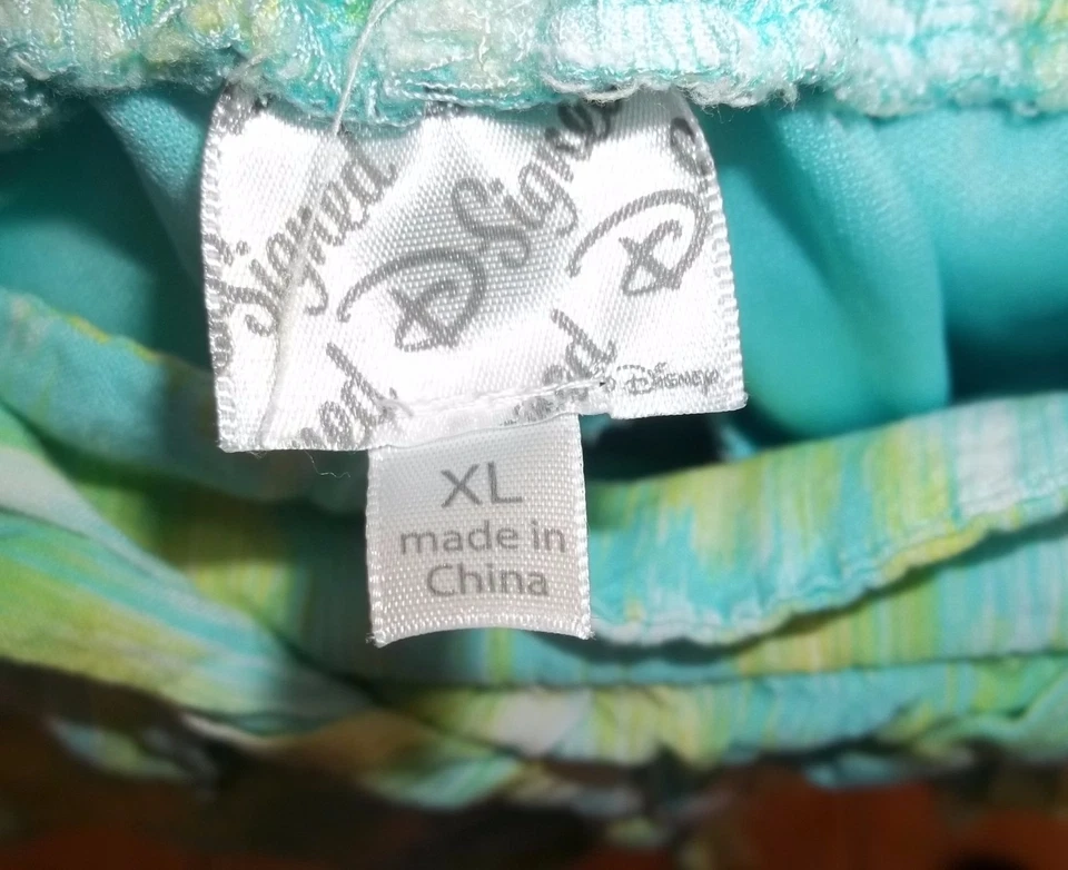SKORT FEMININO DISNEY ASSINADO EM D~tamanho XL~saia NOVA~verde azul AQUA~camadas - Imagem 3 de 4