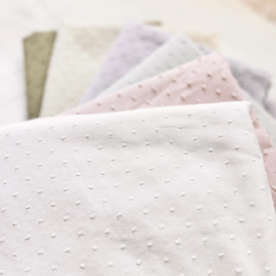 Tela de algodón color blanco roto 57’’ ancho tela de punto suizo Foto 4 de 4