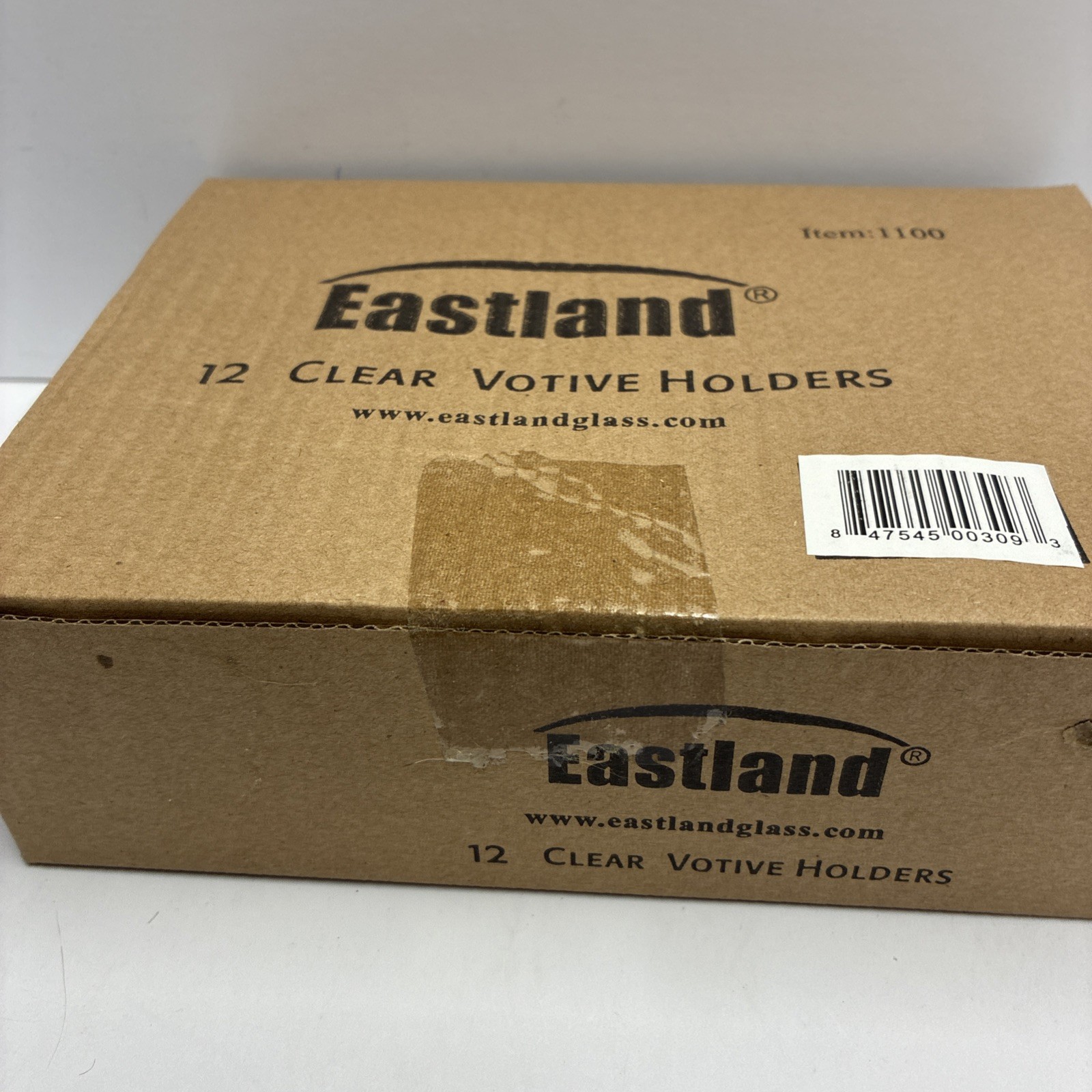 Set of 12 Eastland&reg; Clear Standard Glass Votive Candle Holders Sealed