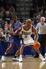Sam Cassell Milwaukee Bucks drives v Charlie Ward New York Knicks- 2002 Photo