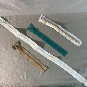 VINTAGE LOT OF 4 ZIPPERS  2 white, 1 teal, & one tan YKK