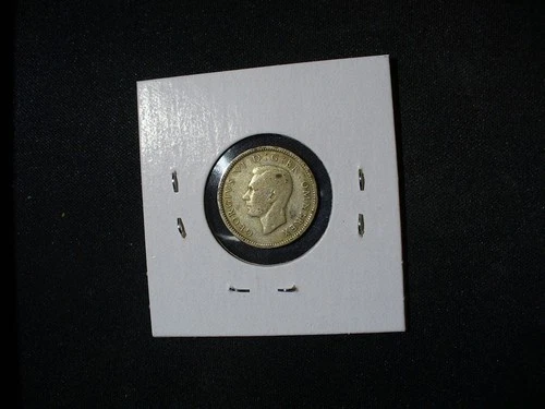 1945 George VI Sixpence — photo from another recent sale