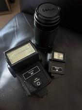 Flashes and telescopic lens