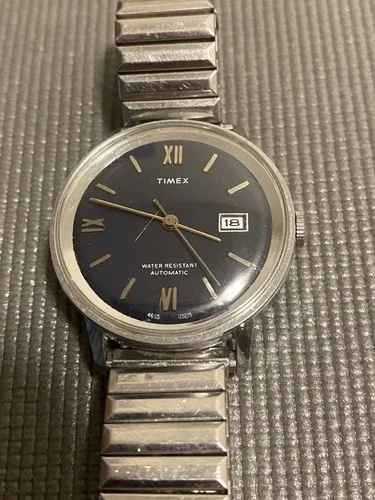 Timex  Men's Automatic Watch W/Date Works Fine (1975).