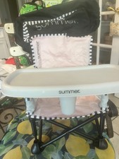 Summer Infant Pop 'n Sit SE Portable Booster Seat in the pink bubble gum