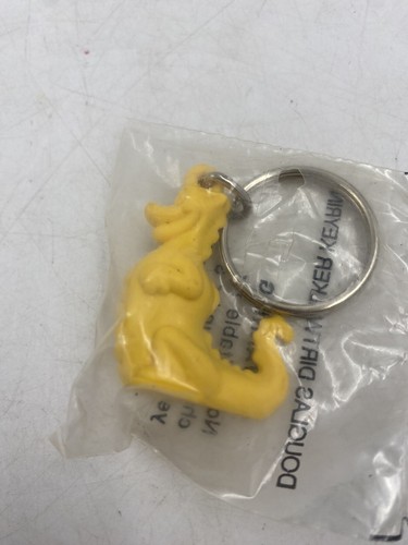 Vintage Tupperware Yellow Douglas Dirtwalker Keyring Sealed in Bag - Picture 2 of 5