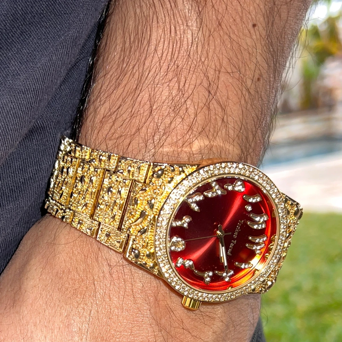 Gold watch red face sale