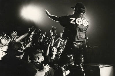 Bono performs live on stage with U2 in front of cheering fans duri- Old Photo