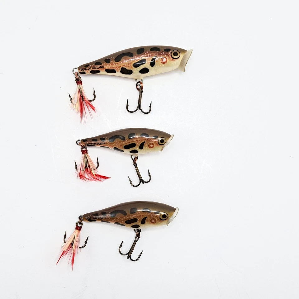 Lote de 3 señuelos Rapala Skitter Pop hechos en Irlanda gancho de pluma de pesca de aguas superiores Foto 2 de 4