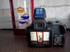 Olympus SP-560UZ 8MP black bridge camera - tested and working