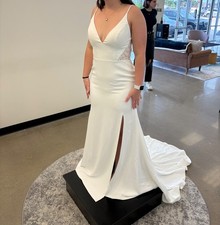 Unworn wedding dress size 12