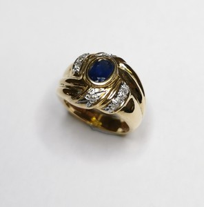 Bague or 18 carats diamants et saphir