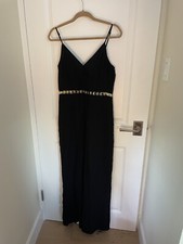 H M black jumpsuit size 12 BWT with gold