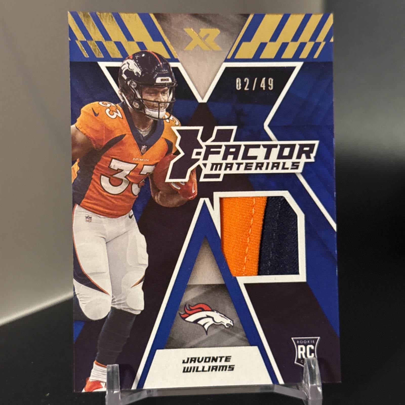 Javonte Williams Panini XR X-Factor Materials #JWI Base