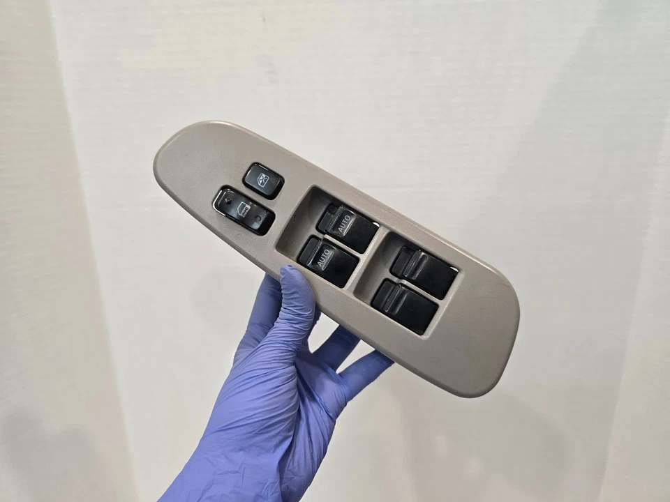 Interruptor de bloqueo de puerta de ventana eléctrica Toyota Sequoia Master Driver 2001-07 gris OEM A134 Foto 2 de 4