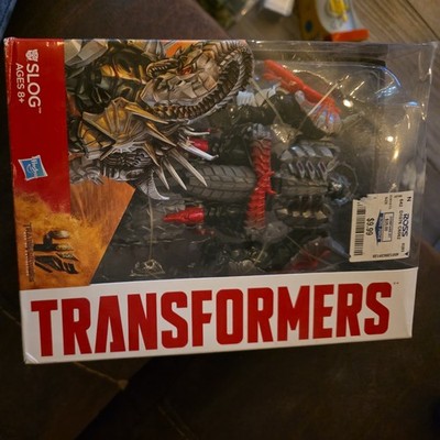Transformers Age of Extinction Voyager Class Slog Action Figure New in Box