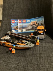 Lego City 4 x 4 with Power Boat. retired set 60085 used complete with instruc.