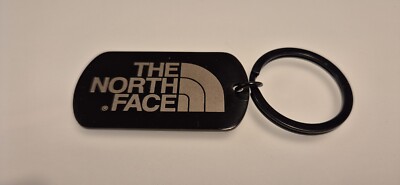 Schlüsselanhänger The North Face mit gravur metall Schwarz Kaws