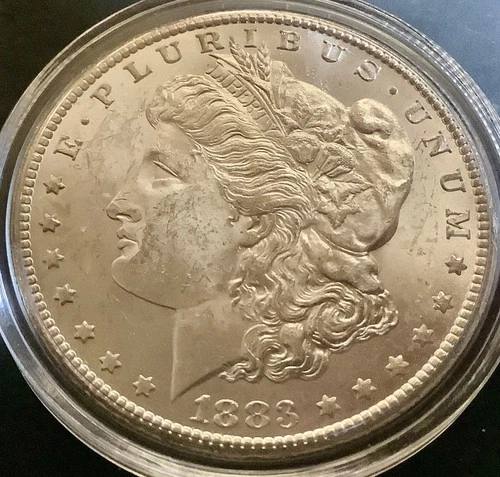 1883 "CC" Morgan SILVER Dollar MINT STATE BU.  Adams Apple Visible On Lady Liber