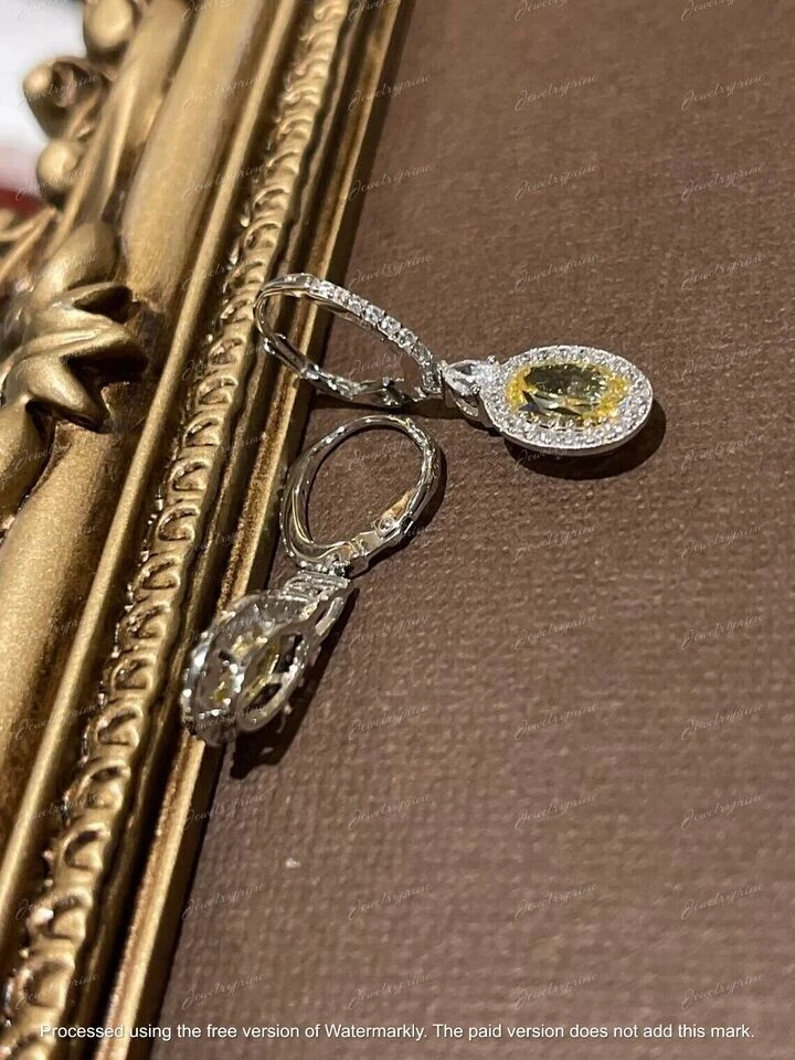 Pendientes colgantes de diamantes canarios de corte ovalado de 4,00 quilates con acabado en oro blanco de 14 quilates Foto 2 de 4