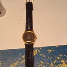 Q&Q Quartz Vintage Analog Water-Resistant Gold Case Black Dial Leather Strap — photo 2