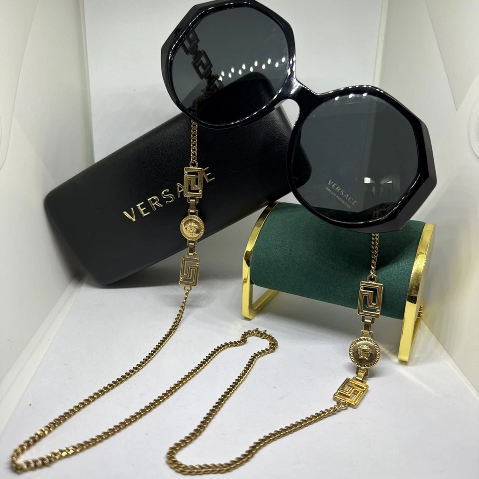 Gafas de sol Versace 4395F 5345/87 58 mm lentes grises con marco negro con detalles dorados Foto 2 de 4