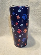 Multi Color Paw Print w/Blue Background Stainless 20oz Tumbler w/lid & straw