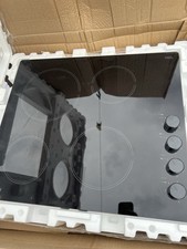 Hotpoint HR 619 C H 58cm Four Zone Ceramic Hob with Side Controls - Black